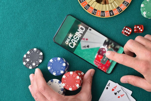 Live Sic Bo dealer table on mobile showing dice cup, betting layout, and player balance